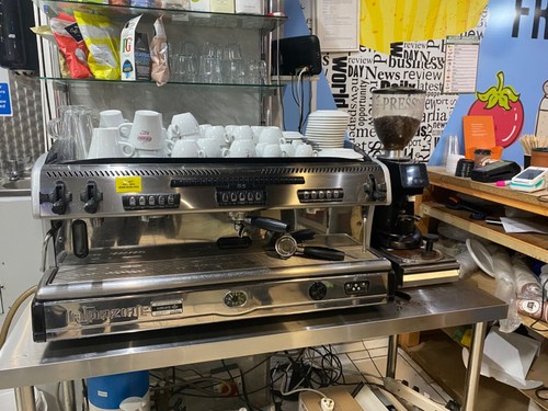 Commercial coffee machine has - machine,,